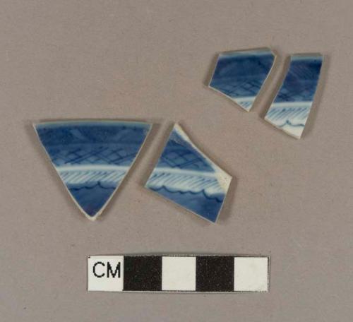 Blue hand painted porcelain rim sherds; two sherds crossmend; two sherds crossmend