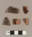 Undecorated lead glazed redware body sherds; five sherds crossmend