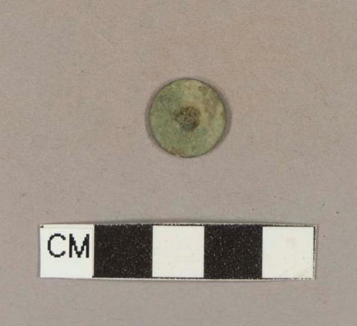 Round, flat copper alloy shanked button, missing shank