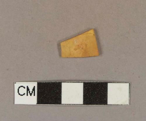 Flat glass fragment, colored or stained orange