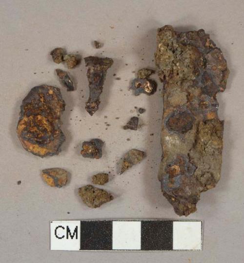 Ferrous metal nail fragments, heavily corroded, 2 ferrous metal sheet fragments