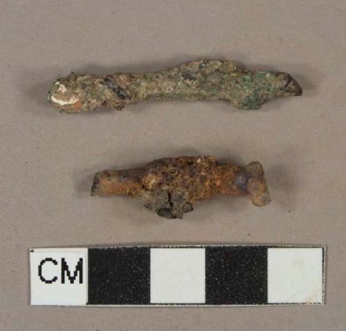 Unidentified copper alloy fragments, corroded