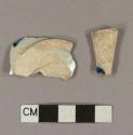 Blue hand painted pearlware base sherds; two sherds crossmend