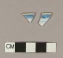 Blue hand painted porcelain rim sherds with brown glazed rim; two sherds crossmend