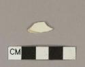 Undecorated cream-colored ironstone body sherd