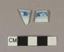 Blue hand painted porcelain rim sherds; two sherds crossmend