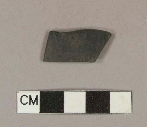 Black plastic record fragment