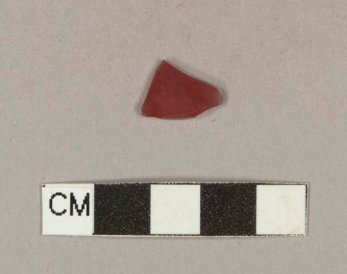 Red plastic fragment