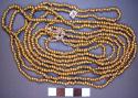 3 1/2 yd. string round gold beads 1/8"d.