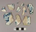 Blue hand painted pearlware body sherds; nine sherds crossmend