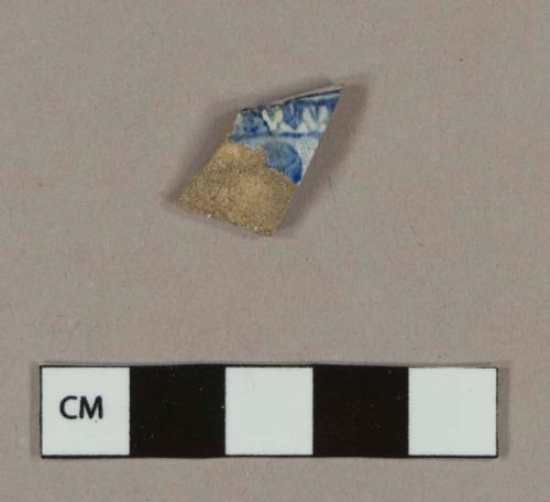 Blue transfer printed whiteware rim sherd