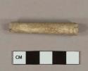 Unsmoked, rouletted and incised pipe stem fragment; 7/64" bore diameter