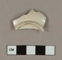 Undecorated white salt glaze stoneware base sherd