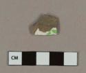 Polychrome hand painted whiteware body sherd