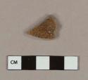 Brown slipped salt glaze stoneware body sherd with white slipped interior