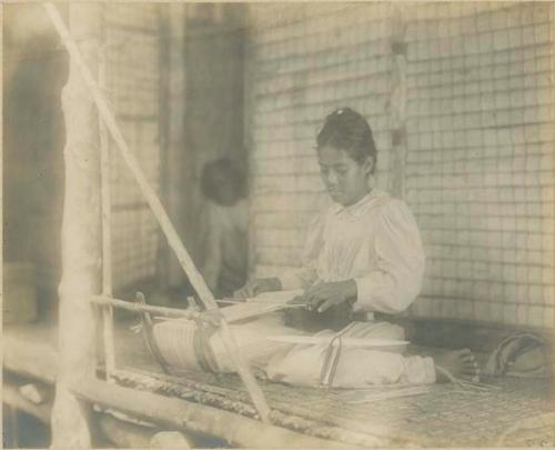 Woman weaving