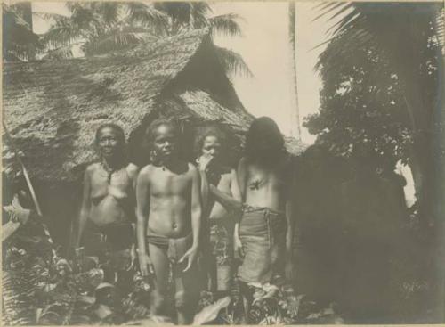 Group standing in front of a house