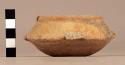 Small low carinated red slipped pottery bowl, 4 punctate lugs on carination - co