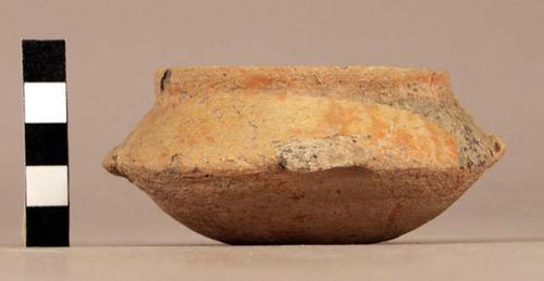 Small low carinated red slipped pottery bowl, 4 punctate lugs on carination - co