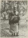 Man standing in front of trees