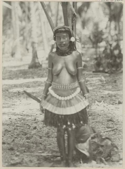 Woman standing in front of tree