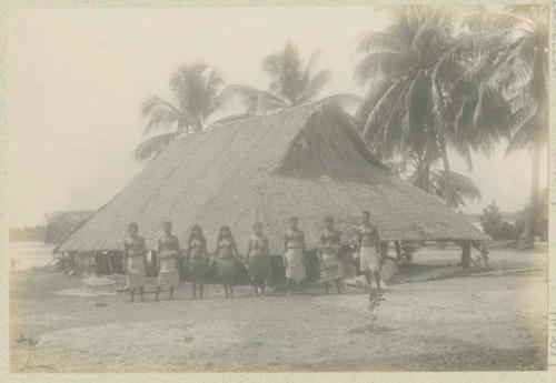 Group standing in front of a house