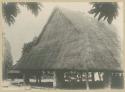 Man standing in front of a house