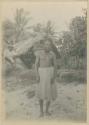 Man standing in front of house