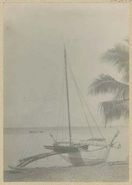 Outrigger canoe on beach