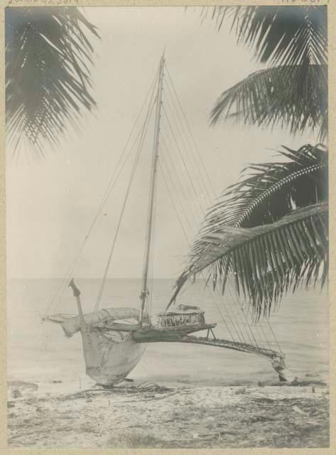 Outrigger canoe on beach