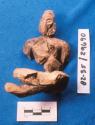 Terra cotta figurine, man, incomplete.