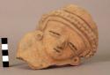 Moulded pottery figurine - large flat head