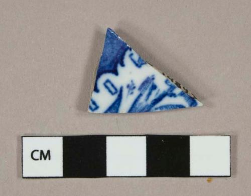 Blue on white transferprinted earthenware vessel body fragment, white paste, lead glaze