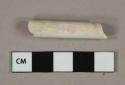 White undecorated kaolin pipe stem fragment, 4/64" bore diameter