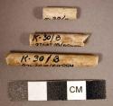 Pieces of white kaolin clay pipe stems