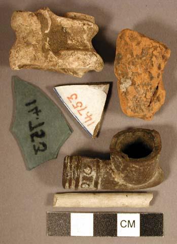 Various articles; bone, pipe frags, glass, porcelain;  historic.