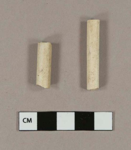 Unsmoked, undecorated pipe stem fragments; one with 4/64" bore diameter; one with 5/64" bore diameter