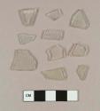 Aqua flat glass fragments; colorless bottle glass fragments; molded colorless bottle glass fragment