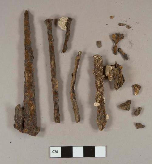 Iron nail fragments, some cut or wrought; iron nail fragments with coal attached; iron nail fragments with mortar attached; iron sheet fragment; unidentified iron fragments