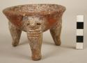 Small Costa Rican tripod vessel.  Undecorated except for dark brown slip.  Intac