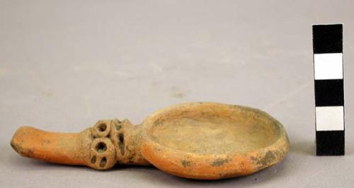 Orange slipped earthenware censer