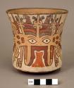 Vase painted in polychrome with two bizarre mythical beings