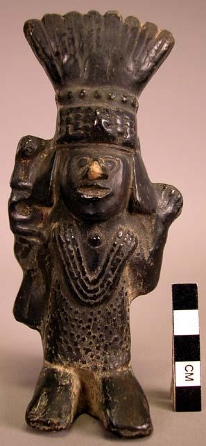 Ceramic figurine, moulded and incised standing human figure