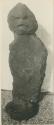 Carved stone figure