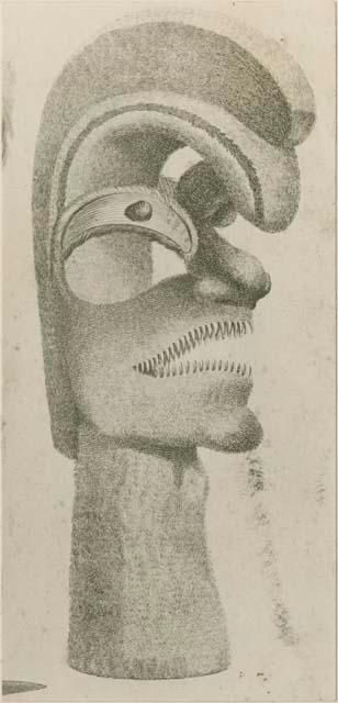 Anthropomorphic head of wicker and feathers