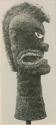 Anthropomorphic head of wicker and feathers