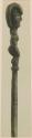 Carved wooden staff with anthropomorphic figure, side