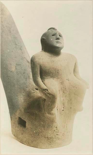 Carved stone anthropomorphic figure