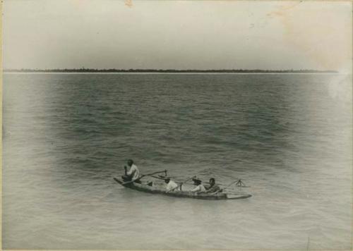 Men in outrigger canoe