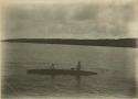 Men in outrigger canoe